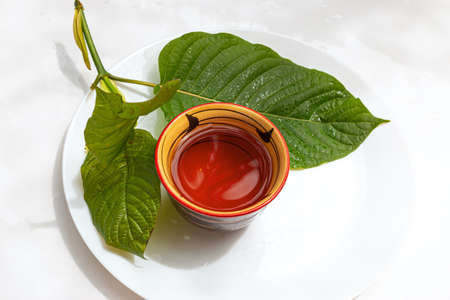 Kratom leaves and Kratom leaf juice or kratom leaf tea