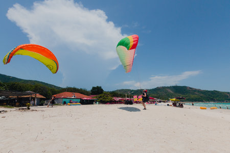 Paraglider on the beach at Samae beach, Koh Larn, Pattaya, Chonburi, Thailand.の写真素材