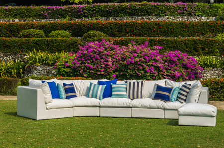 Outdoor sofa with outdoor water resistant cushions and pillowsの写真素材