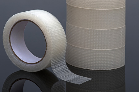 Medical sticking plaster on black backgroundの写真素材