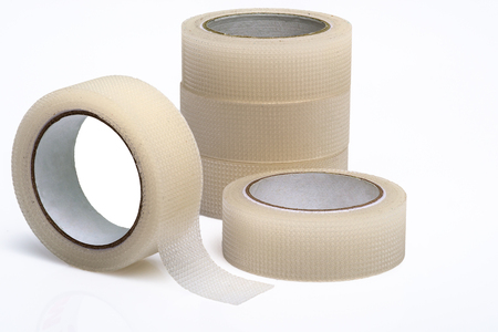 Medical tape sticking plaster on white backgroundの写真素材
