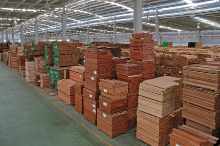 Stacks of Wood in Warehouse Wood factoryのeditorial素材