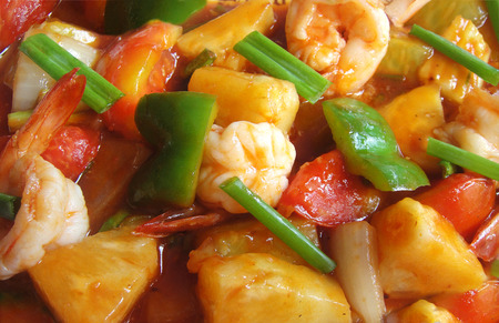 Sweet and sour shrimps with pineappleの写真素材