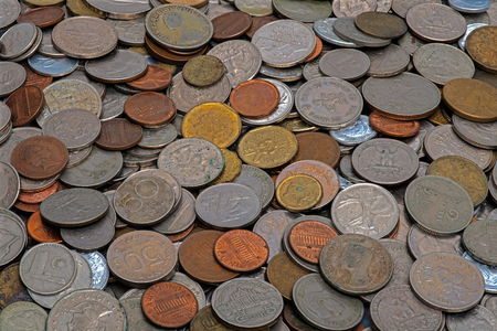 Old coins, different sizes, from different countriesの写真素材