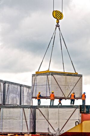 Loading cargo into the shipの写真素材