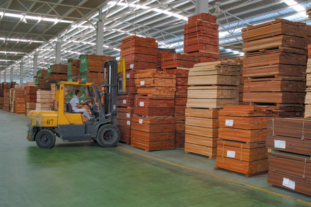 Stacks of Wood in Warehouse Wood factoryのeditorial素材