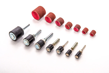 Sanding grinding and polishing sanding drill bit set photo on white backgroundの写真素材
