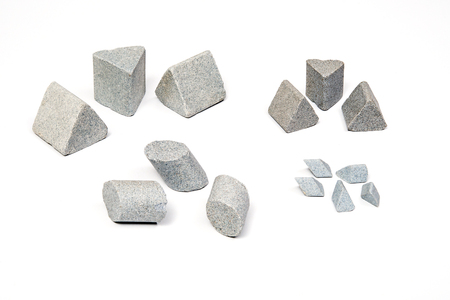 Sharpening stones sets in different shapes on white backgroundの写真素材