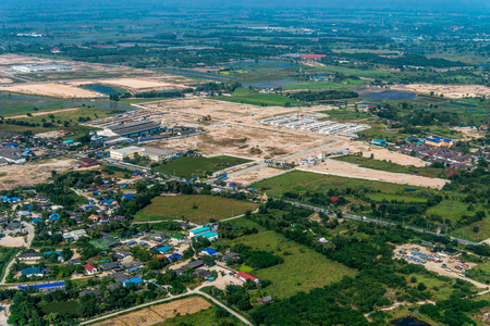 Industrial estate land development construction and residential area aerial viewの写真素材