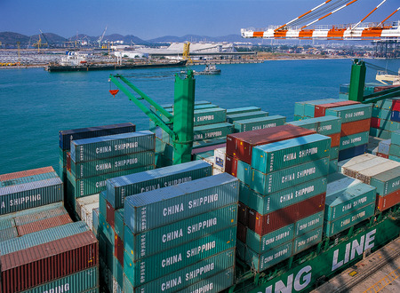 Moving Containers in Ports Shipyard and loading into shipのeditorial素材