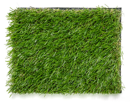 Grass mat on white background. Artificial turf tile background.の写真素材