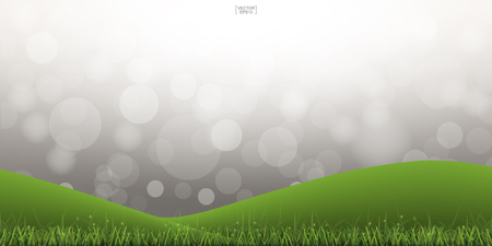 Green grass hill with light blurred bokeh background. Outdoor abstract background. Vector illustration.のイラスト素材