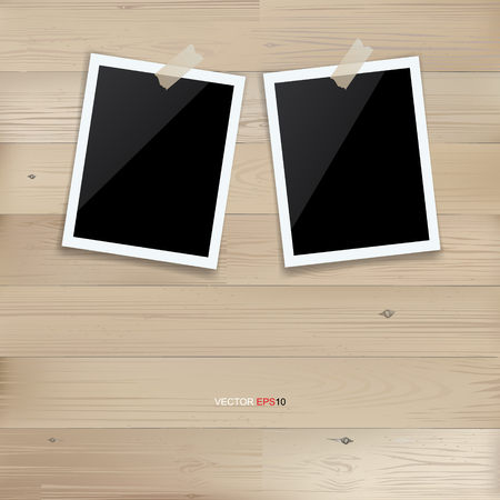Blank photo frame on ooden background. Vector vintage background.のイラスト素材