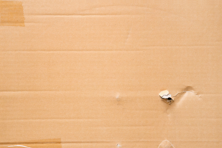 Brown paper box or corrugated cardboard sheet texture for background.の写真素材