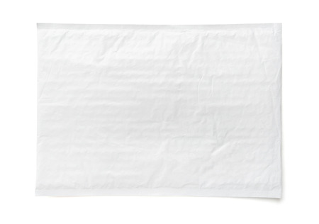 White postal package. Plastic parcel object background for online shopping advertising. Object isolated on white background with clipping path.の写真素材