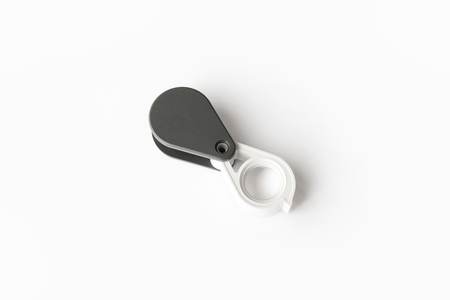 Magnifying glass for diamonds or see the amulet Isolated on a White Background. Eye Lens Magnifier.