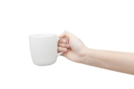 Coffee cup in hand. Isolated on white backgroundの写真素材