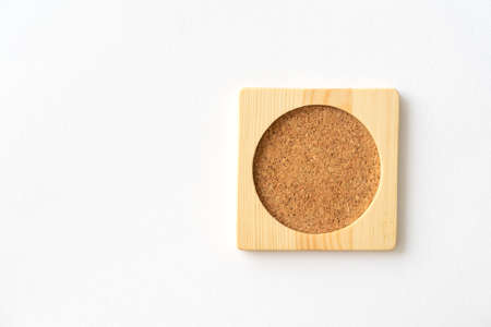 Wooden cork plate mat for water glass or coffee cup. Close-up.の写真素材