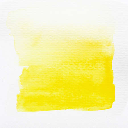 Yellow watercolor brush strokes with space for your own text. Close-up.の写真素材