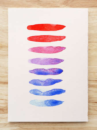 Colorful watercolor stains on white paper. Set of watercolor brush stripes. Ink strokes. Flat kind brush stroke. Close-up.の写真素材