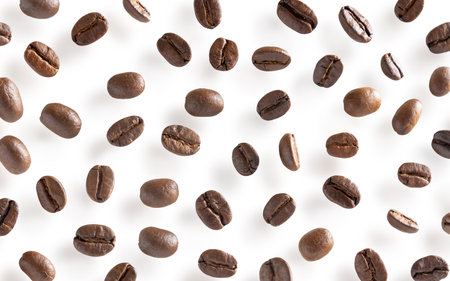 Roasted coffee beans. Scattered coffee beans on a white background with clipping paths. Close up.の写真素材