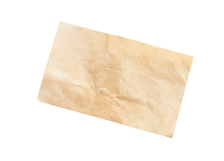 Old paper sheet background. Grunge vintage paper texture isolated on white background with clipping path. Close up.の写真素材