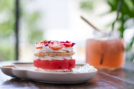 Watermelon cake with strawberry sliced on top