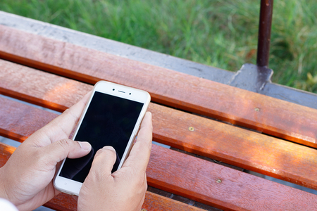 Image of male hands using smartphone.の写真素材