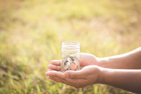 Man saving money in future. finance and business concept.の写真素材