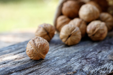Walnuts on wooden background. health food concept.の写真素材
