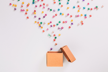 Top view of gift Box and colorful bell on blue background. Christmas concept.の写真素材