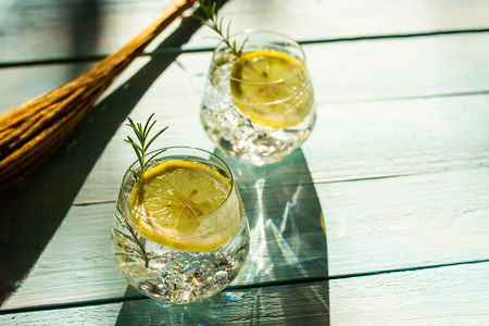 Lemon drink on white wooden background. health drink concept.の写真素材
