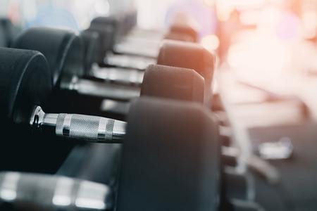 Close up of black dumbbell set at gym. exercise concept.の写真素材