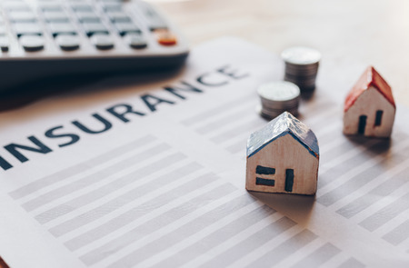 Home insurance form with money,passbook  and calculator.の写真素材