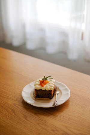 pieces of carrot cake on white dish.Homemade bakery concept.の素材 [FY310190390807]