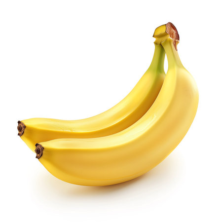 A perfect bunch of ripe bananas isolated on a white background, their bright yellow peel indicative of sweet, ready-to-eat fruitの素材