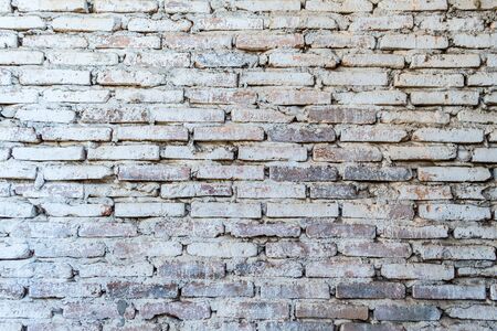 Background of old vintage brick wall, can be used for display or montage your products.の写真素材