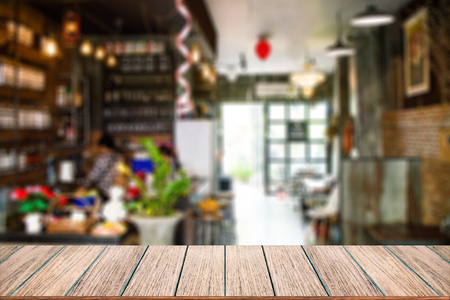 Empty wood table top on Blurred image background, perspective wood can be used for display or montage your products.の写真素材