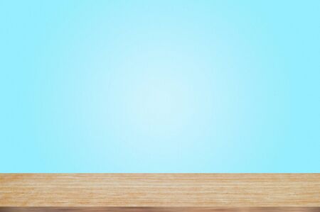 Empty wood table top on pastel color background, perspective wood can be used for display or montage your products.の写真素材