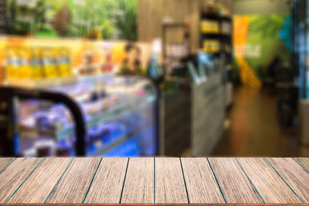 Empty wood table top on Blurred image background, perspective wood can be used for display or montage your products.の写真素材
