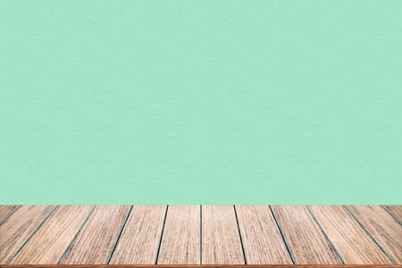 Empty wood table top on pastel color background, perspective wood can be used for display or montage your products.の写真素材