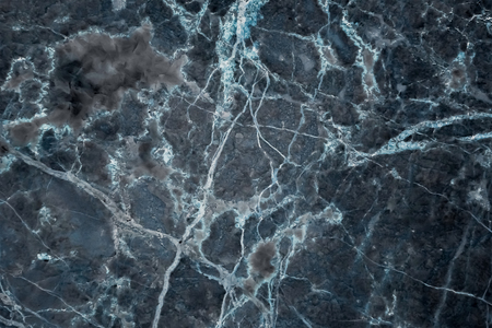 Multicolored dark marble patterned texture background, Detailed real genuine marble from nature, Can be used for creating a marble surface effect to your designs or images.の写真素材