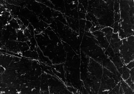 Black Marble pattern with white veins useful as background or texture, Detailed real genuine marble from nature, Can be used for creating a marble surface effect to your designs or images.の写真素材