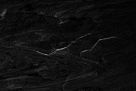 Black stone pattern texture background, Detailed of real genuine stone from nature, Can be used for creating surface effect to your designs or images.の写真素材