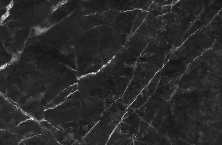 Black and dark marble texture shot through with white deep veining (Pattern for backdrop or background, Can also be used create surface effect to architectural slab, ceramic floor and wall tiles)の写真素材
