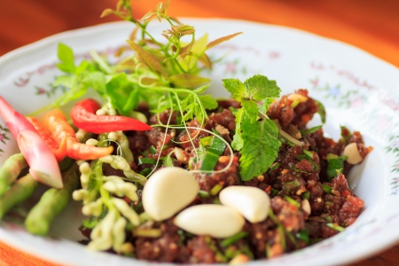 raw minced meat for thai food on a plateの写真素材