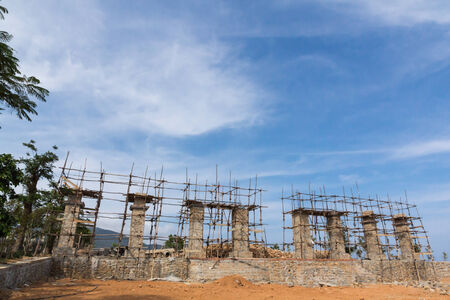 Start of concrete monolithic frame of new building on the background blue skyの写真素材