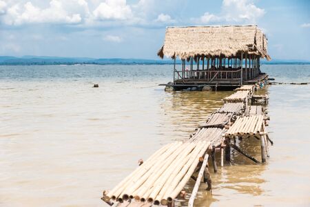 Floating restaurant in reservoir  with blue sky backgroundのeditorial素材