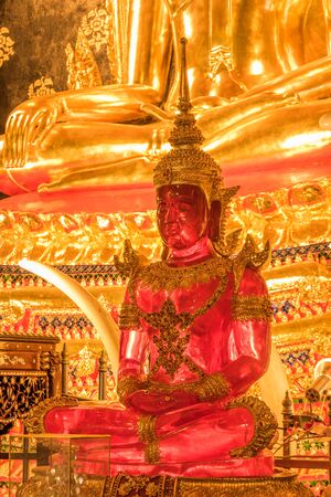 pink buddha among other buddhas in Loei ,Thailandのeditorial素材