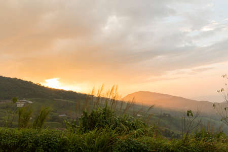 fog and cloud over mountains at sunrise in the morning